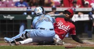 Marte hits walk-off single after Reds lose tying run on lodged ball, Cincinnati tops Blue Jays 5
