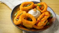 The Step You Shouldn't Skip For Better Onion Rings