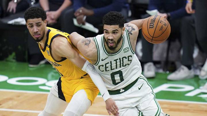 Celtics’ Jayson Tatum communicates with other players who have suffered Achilles injuries