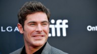 Zac Efron looks completely unrecognizable on romantic Italian holiday