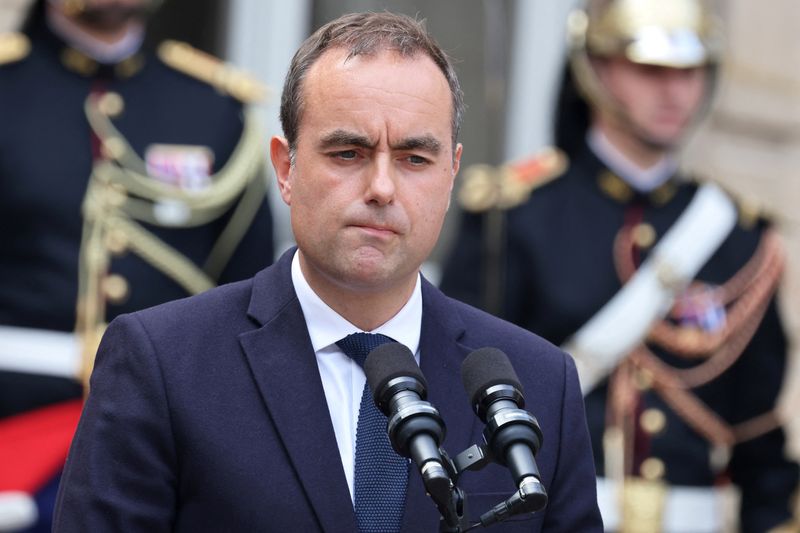 France's new prime minister takes office amid anti