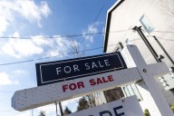What the Fed’s rate cut means for buying a home, refinancing