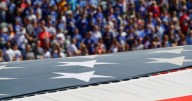 VIDEO: Man Gets Stuck on Giant American Flag at Jets