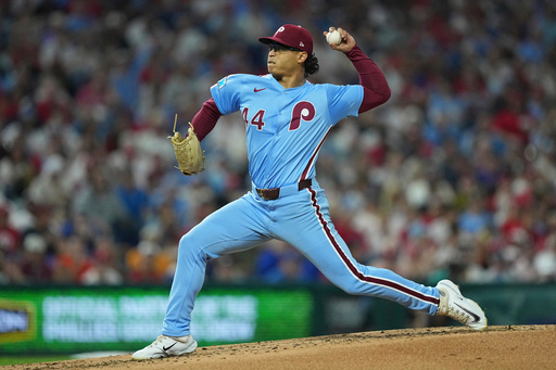 Luzardo retires 22 straight after rough start as Phillies sweep Mets and eye NL East title