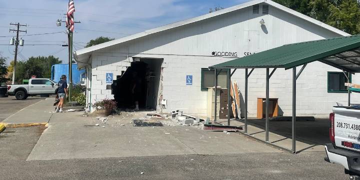 Pick-up trucks drives through Gooding Senior Center