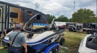 Boat catches fire at Lake Tyler storage, causing damage to surrounding vehicles