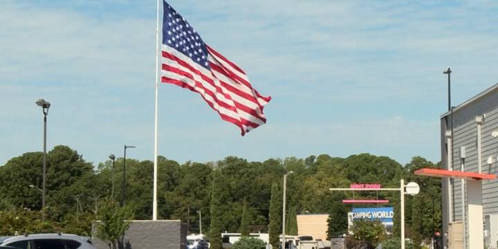 Governor says bill that allows Camping World flag will become law without his signature
