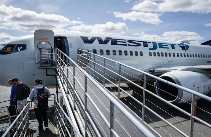 WestJet flight attendants seek to address alleged unpaid work in new agreement