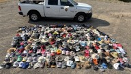 Pizza Slices, Polaroids, And Over 300 Hats – Just Some Of The 13,000 Pieces Of Trash Found At Yellowstone In 2025