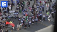 Brisbane protesters shine light on journalists killed in Gaza