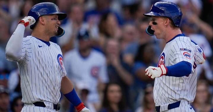 Cubs beat Cardinals 7-3 to clinch NL wild card spot