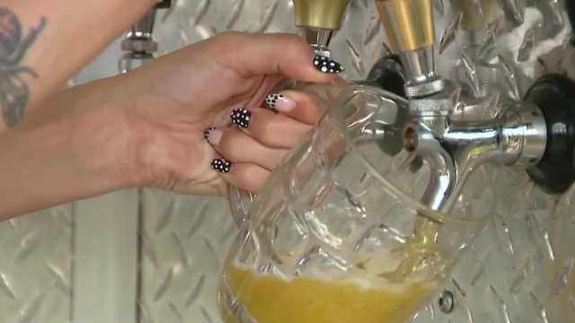 Des Moines Biergarten kicks off Oktoberfest with golden keg bike ride