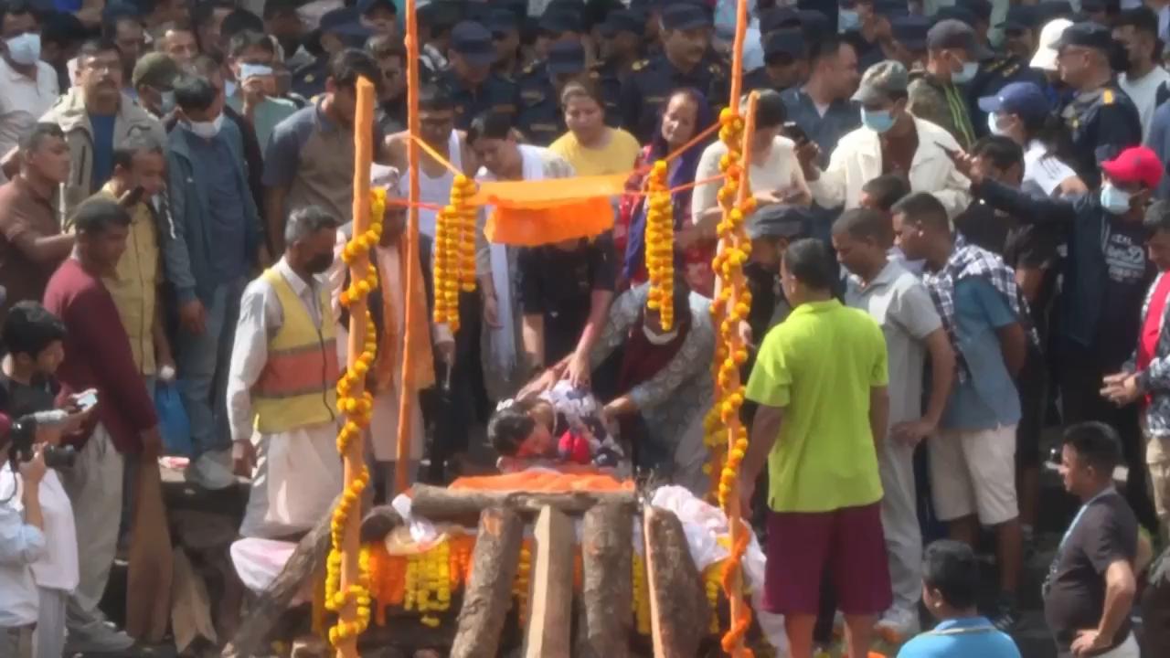 Grieving relatives receive remains of loved ones killed in days of violent protests in Nepal