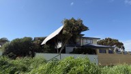 House in Falcon loses its roof in strong winds, ends up on neighbouring property