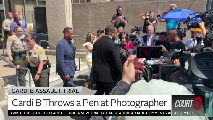 Watch Cardi B Throw Pen at Photographer