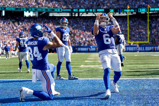 Dart's impressive debut leads Giants to 1st win over Chargers, but await word on Nabers' injury