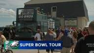 Eagles cheerleaders, mascot kick off bus tour with legend Brandon Graham