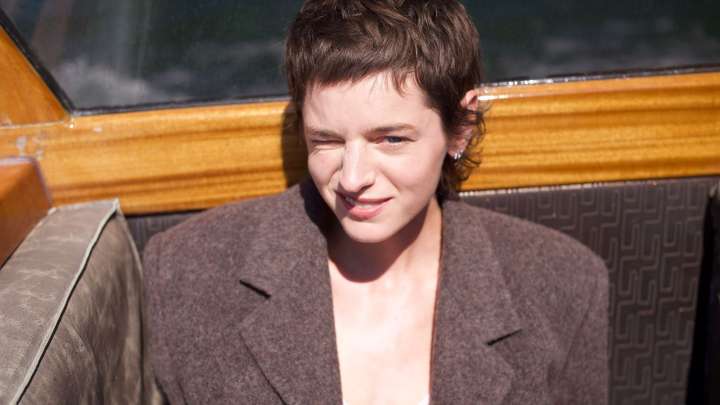 Emma Corrin On Why Venice Film Festival Is Their Favourite Time Of The Year – And The “Once-In