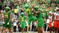 Oregon jumps to No. 4 in AP Top 25 behind Ohio St, Penn St, LSU; Illinois, Florida State into top 10