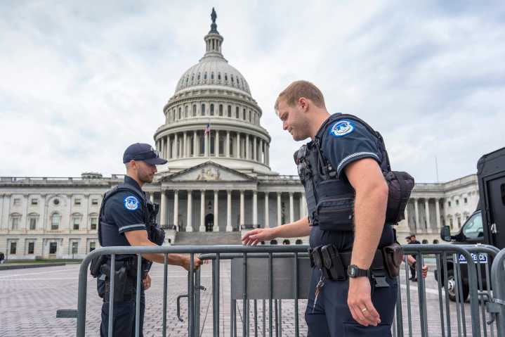 How should federal employees prepare for a potential government shutdown?
