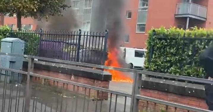 Car bursts into flames on Glasgow street as man, 32, arrested in connection