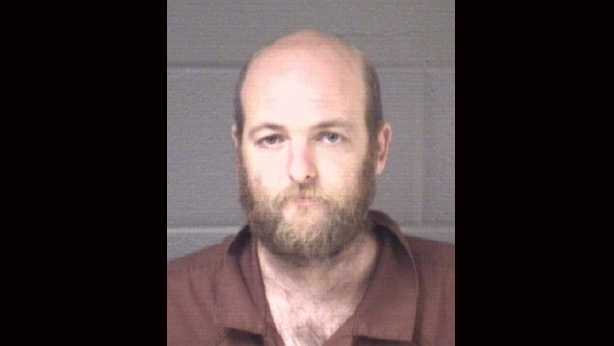 Man falls off wall, fires at Good Samaritan in Asheville