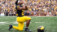 Michigan football's Justice Haynes puts up big numbers, not watching them