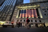 Asian shares trade mostly higher after Wall Street snaps its 3
