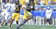 Edwards' short TD run in overtime leads West Virginia over Pittsburgh 31