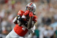 Sayin passes for 3 touchdowns, top-ranked Ohio State pulls away in second half to defeat Ohio 37