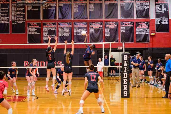 High school volleyball: Cougars take first place