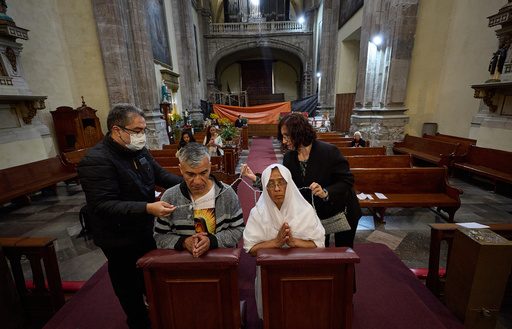 Mexican churches mark the anniversary of deadly quakes with remembrance and lessons for the future