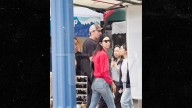 Armie Hammer Grabs Lunch, Walks Through Farmer's Market with Mystery Woman