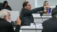 RFK Jr.'s vaccine panel backs away from plan to require an Rx for a COVID shot