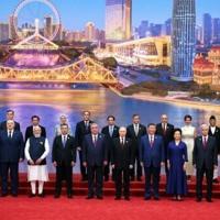 Leaders gather with China's Xi for summit ceremony
