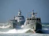 Taiwan reports Chinese aircraft, five naval vessels near its waters
