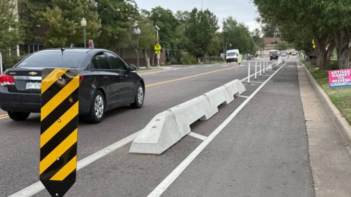 Protected bike lane installed in Littleton on Church Avenue