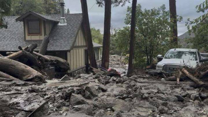 Mudslides trap drivers, bury roads and damage homes in southern California