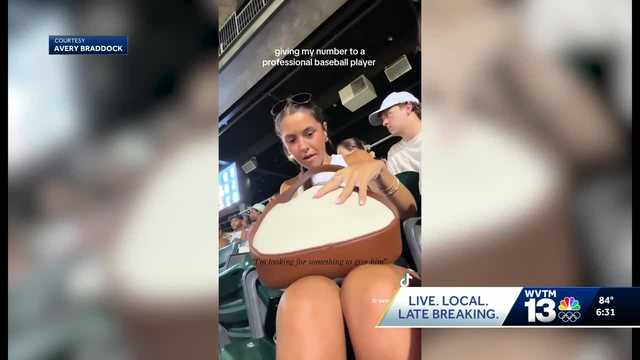 "give him my number": Alabama Woman goes viral swinging for love during Barons' game