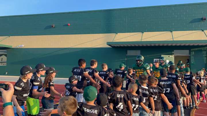 Santa Fe Youth Football players welcomed the Indians