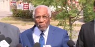 Lawyers representing Des Moines Superintendent Dr. Ian Roberts hold news conference