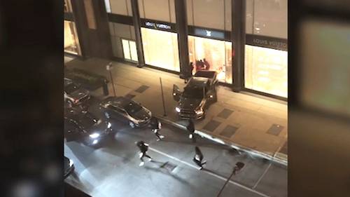 Burglars ram truck into Louis Vuitton store in Chicago; bystander killed in rollover crash involving getaway car