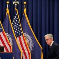Stocks torn between Fed rate warning, AI optimism