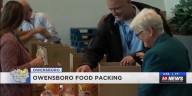 City officials pack pantry boxes for 7th annual food packing event