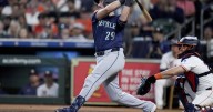 Seattle's Raleigh has record-setting home run ball personally delivered by Astros' staffer