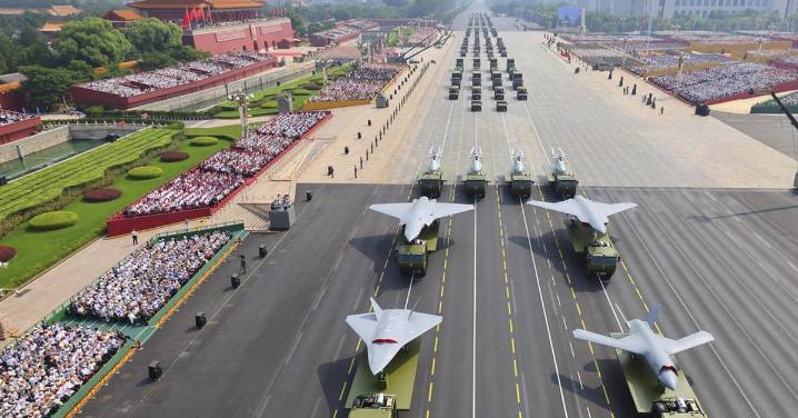 China military parade: Nukes, lasers and 'robot wolves' on show as China flexes military might