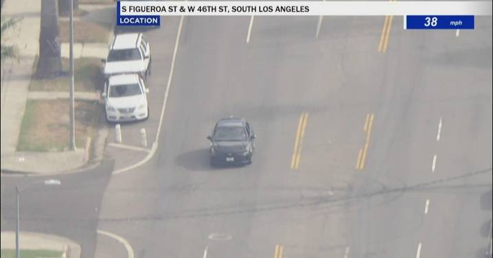 Police in pursuit of a murder suspect in South LA