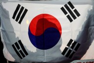News Wrap: South Korea negotiates release of workers detained in U.S. raid