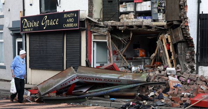 Car ploughs into takeaway after police chase leaving scene of devastation on busy main road