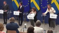 Shocking moment Sweden's health minister Elisabet Lann collapses during press conference